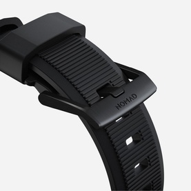 Nomad Rugged Strap 40mm/38mm in black, showing textured rubber band with black buckle clasp and branded logo detail