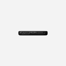Nomad Rugged Case MagSafe iPhone 12/12 Pro in black, bottom edge view showing USB-C port and speaker grille cutouts