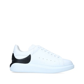 Alexander McQueen Show Drop Tab Trainers in white leather with black contrast heel tab and chunky white sole