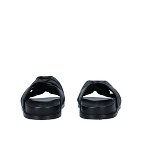 Carvela Comfort Solo Sandals in black, slip-on slides with twisted strap detail, flat sole, rear view