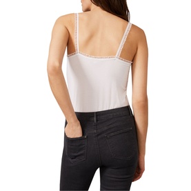Model wearing Phase Eight Sequin Slim Fit Cami in white with sequin trim detail, styled with dark grey skinny jeans. Rear view