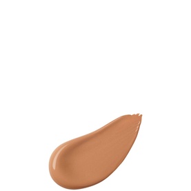 Shiseido Total Radiance Foundation swatch in a warm medium-tan shade, showing smooth creamy texture