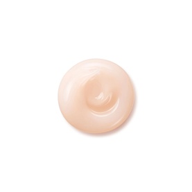 Shiseido Overnight Cream & Mask texture swatch, showing a smooth peach-toned cream swirl on a white background