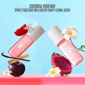 Sol De Janeiro Cheirosa '40 Hair + Body Fragrance Mist duo in pink and white bottles styled with tropical flowers and fruit