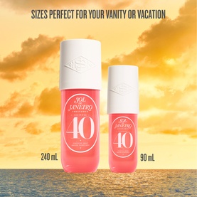 Sol De Janeiro Cheirosa Your Way fragrance mist duo in pink and white bottles styled with tropical flowers and fruit