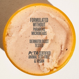 Sol De Janeiro Bum Bum Body Scrub, open jar viewed from above showing sandy-pink textured scrub formula with yellow-orange rim