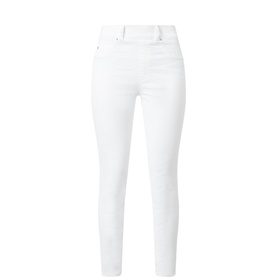 Spanx SPANXshape&trade; EveryWear Ankle Skinny Jeans in white, pull-on style with smooth front, slim leg and ankle length