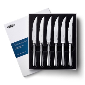 Stellar Kitchen Six-Piece Steak Knife Set in silver stainless steel with serrated edges, presented in a black-lined gift box