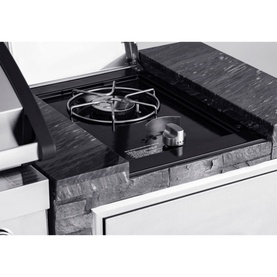 Grandhall Stone Island Outdoor Kitchen close-up showing single gas burner hob with trivet on dark stone worktop surface
