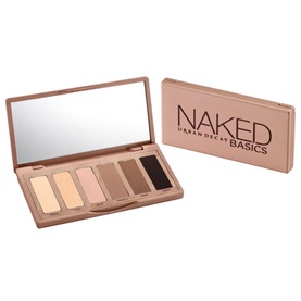 Urban Decay Naked Basics Eyeshadow Palette open showing 6 neutral matte shades, with rose-gold compact packaging and mirror