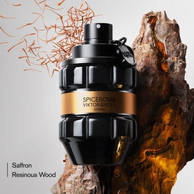 Viktor & Rolf Spicebomb Extreme Eau de Parfum 50ml, black grenade-shaped bottle with gold band, surrounded by saffron and resinous wood