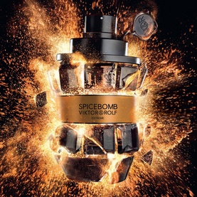 Viktor & Rolf Spicebomb Extreme Eau de Parfum 50ml, grenade-shaped black and gold bottle with explosive dramatic backdrop