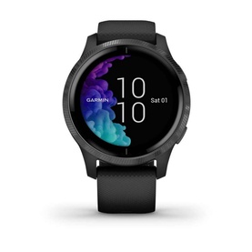 Garmin VENU smartwatch in black with gunmetal case, round AMOLED display showing time and colourful abstract screensaver, black silicone strap