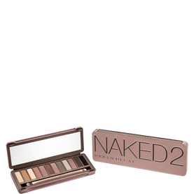 Urban Decay Naked 2 Eyeshadow Palette open showing 12 neutral mauve-toned shades with mirror, beside rose-gold compact case
