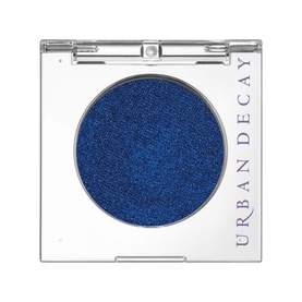 Urban Decay 24/7 Moondust Shadow in Charged, a shimmering deep blue single eyeshadow in clear compact case