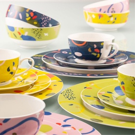 Aynsley Verdant Cereal Bowls Set of 4 in multi-coloured abstract print, styled with matching plates and cups in yellow, navy and pink