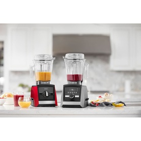 Vitamix Ascent Series A2500i Blender in red and slate variants on kitchen counter, blending orange and berry smoothies