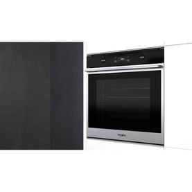 Whirlpool W Collection Built-In Electric Oven in silver with stainless steel trim, touch controls, and interior rack, shown with black panel detail