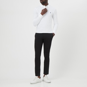 Model wearing Ralph Lauren Long Sleeve Slim Fit Polo Shirt in white with pointed collar and embroidered logo