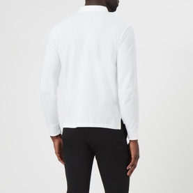 Model wearing Ralph Lauren Long Sleeve Slim Fit Polo Shirt in white, rear view, styled with black trousers