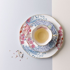Wedgwood Butterfly Bloom Teacup and Saucer set in multicolour floral and paisley print with gold rim, styled with matching plate