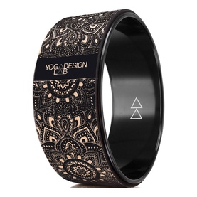 Yoga Design Lab Mandala Yoga Wheel in black with intricate gold mandala pattern, circular ring design with branded logo