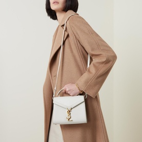 Cassandra Monogram Embossed Leather Mini Bag