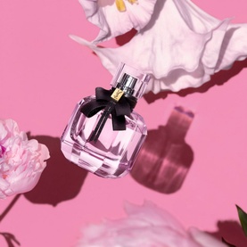 Yves Saint Laurent Mon Paris Eau de Toilette 150ml, pink square bottle with black bow, styled with pink peonies on pink background