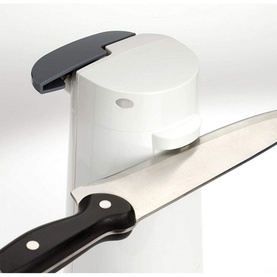 Kenwood Can Opener & Knife Sharpener in white and black, shown sharpening a kitchen knife blade through the device slot