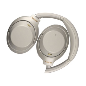 Sony Wireless Noise-Cancelling Headphones in silver, over-ear foldable design with cushioned ear cups and gold accent detailing