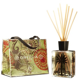 Ortigia Fico d'India Diffuser with reed sticks in square glass bottle with black cap, shown alongside branded gift bag