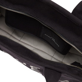 Marc Jacobs The Jacquard Large Tote Bag in black, interior view showing zip pocket, grey lining and branded label
