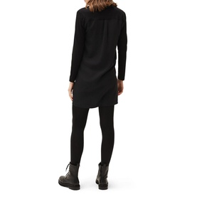 Model wearing Phase Eight Neave Button Tunic in black with long sleeves, styled with black leggings and chunky ankle boots, rear view