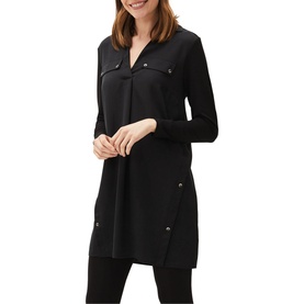 Model wearing Phase Eight Neave Button Tunic in black with long sleeves, V-neck, shirt collar, and chest pockets, styled with black leggings