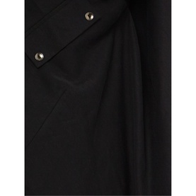 Phase Eight Neave Button Tunic in black, close-up showing gold-tone snap buttons and draped fabric detail at chest
