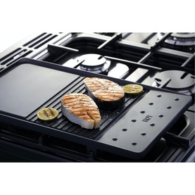 Rangemaster Professional+ 110 Dual Fuel Rangecooker black cast iron griddle with grilled salmon fillets and lemon slices