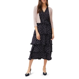 Model wearing Phase Eight Salma Light Knit Jacket in cream, crop length, 3/4 sleeves, styled over a navy polka dot tiered midi dress