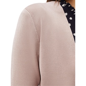 Model wearing Phase Eight Salma Light Knit Jacket in cream, styled over a polka dot top. 3/4 sleeves and edge-to-edge design visible