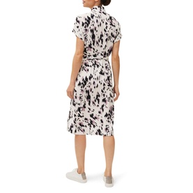 Model wearing Phase Eight Tilda Tie Waist Dress in cream abstract print, short sleeve midi length with tie waist belt, styled with white trainers