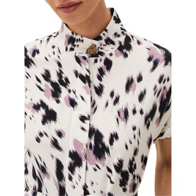 Model wearing Phase Eight Tilda Tie Waist Dress in cream with abstract black and pink print, short sleeves, and collared neckline