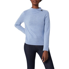 Model wearing Hobbs Talia Round Neck Sweater in blue with high neckline, button shoulder detail, and long sleeves, styled with dark jeans
