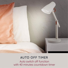 iStar Wireless Charging Lamp in white, styled on bedside table in bedroom setting, with auto off timer text overlay