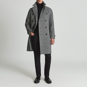 Model wearing Reiss General Houndstooth Double-Breasted Coat in black, styled with black roll neck and trousers