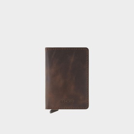 Secrid Slim Vintage Card Protector Wallet in chocolate brown leather with subtle embossed logo and card slide mechanism