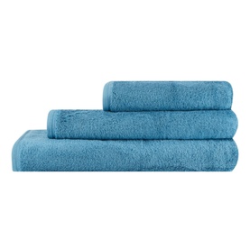 Vossen Vegan Towel Sea Shimmer in blue, shown as a set of three stacked towels in varying sizes with a plush terry texture