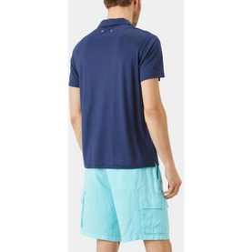 Model wearing Vilebrequin Pirinol Polo Shirt in navy, short sleeves, polo collar, styled with aqua cargo shorts, rear view