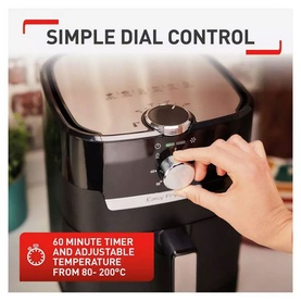 Tefal EasyFry Classic Air Fryer & Grill with hand adjusting dial control, showing simple dial and 60-minute timer feature