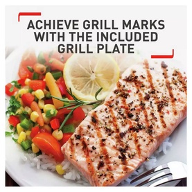 Tefal EasyFry Classic Air Fryer & Grill achieving grill marks on salmon fillet, served with rice and vegetable salad on white plate