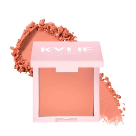 Kylie By Kylie Jenner Pressed Blush Powder in coral-peach, 7.5g compact with soft-matte powder swatch beside pink packaging