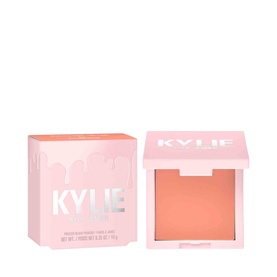 KYLIE BY KYLIE JENNER Pressed Blush Powder in peach-coral shade, shown beside its pink compact box, 7.5g